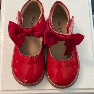 Red patent leather girls Mary Jane shoes